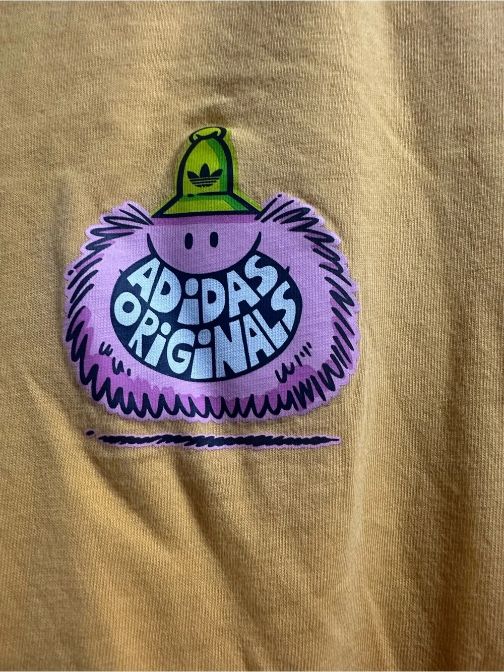 adidas Originals Yellow Tee with Pink Mascot and Green Cap